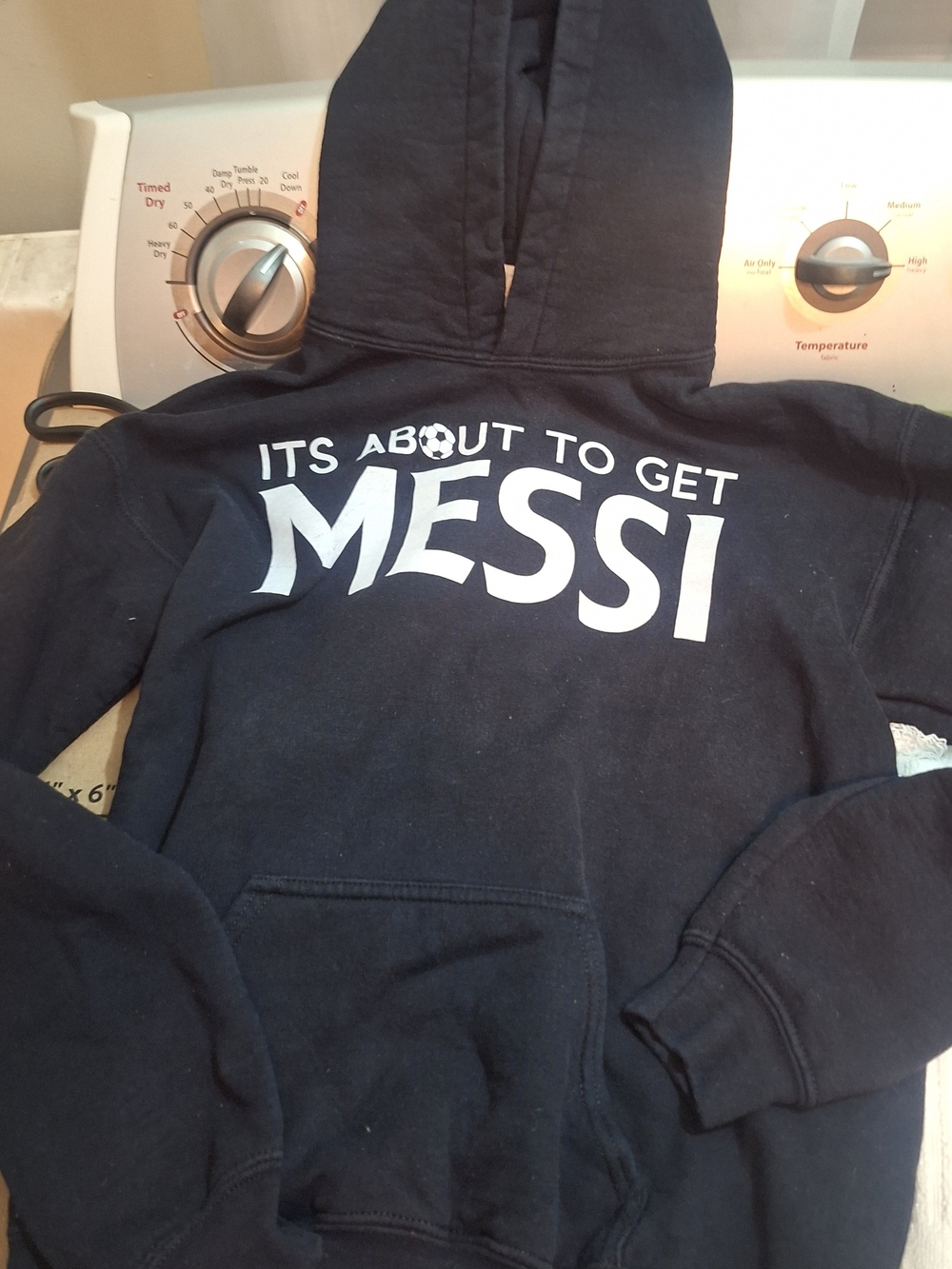 Gildan Black Kids Hoodie with White "It's About to Get Messi" Graphic